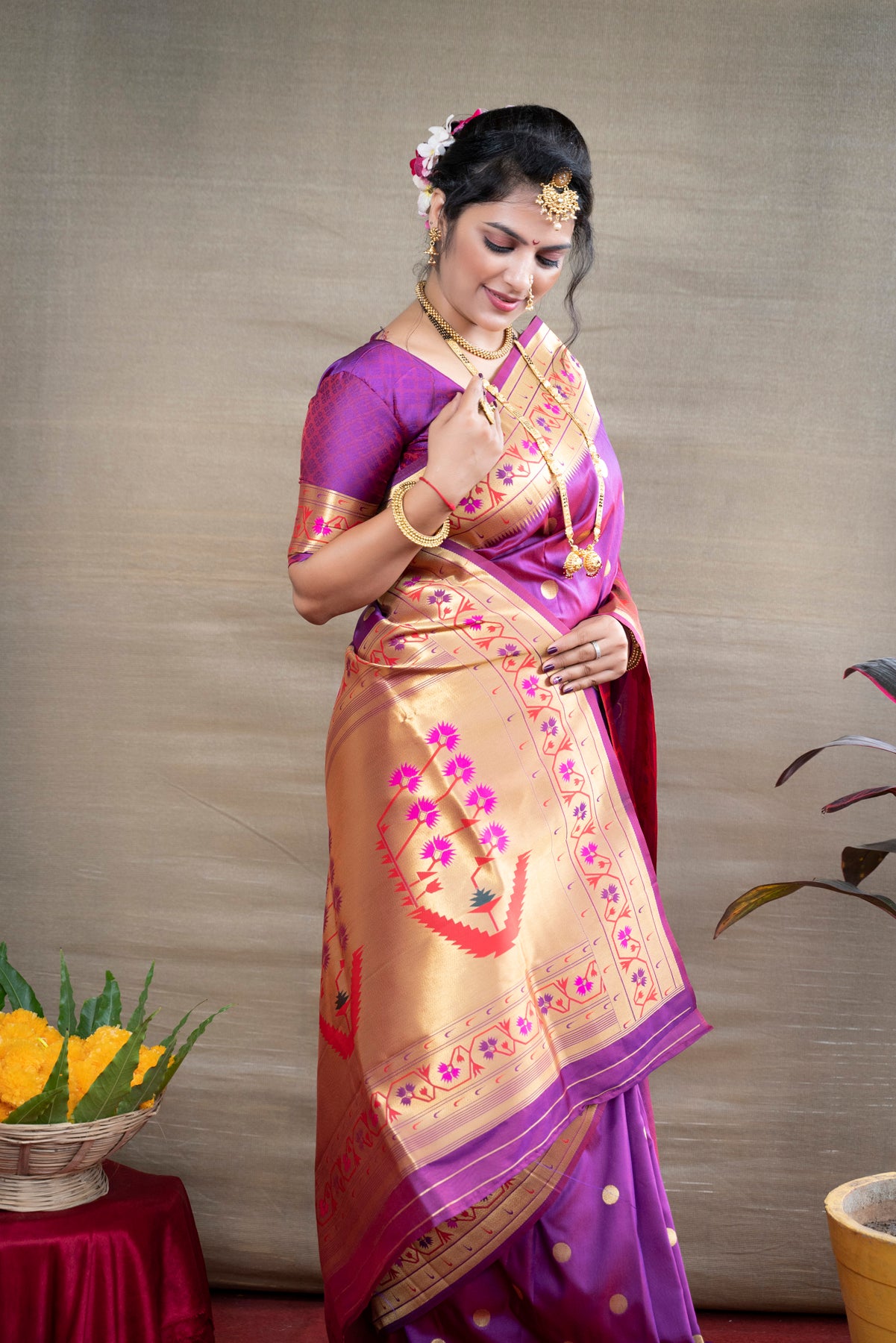 Rani Magenta color with Peacock Green Boarder In Paithani Silk Saree.